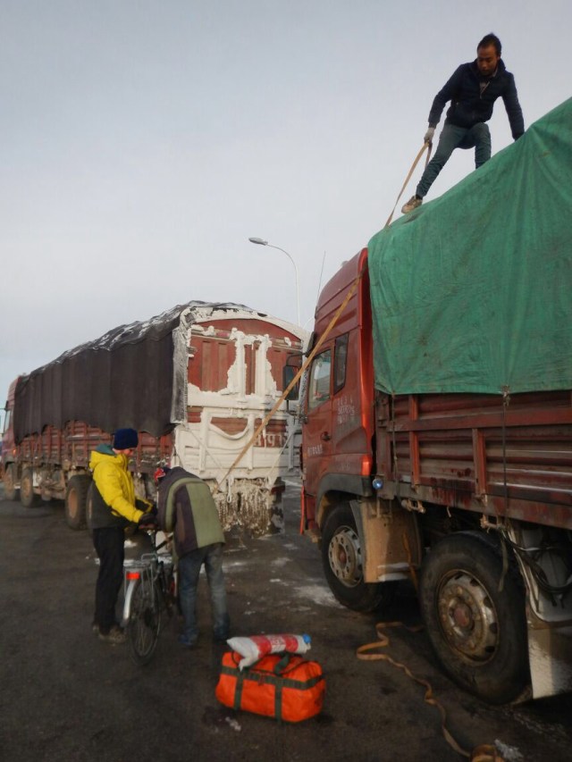 Lobby's bike being loaded in Maduo, en route to Xiewu, 31 Jan 15