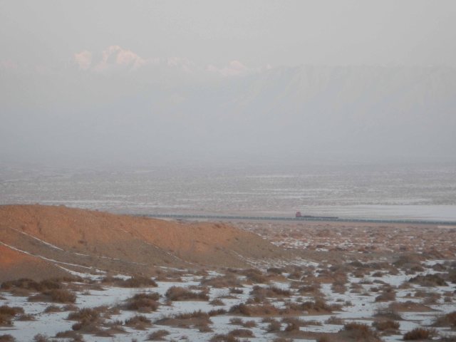 A 32-wheel flatbed truck makes its way along the Northern Road, 9 Jan 15