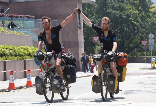 Britons Nick Codrington, 24, and Laurence Gribble, 23, make it to The Peak yesterday. Photo: David Wong